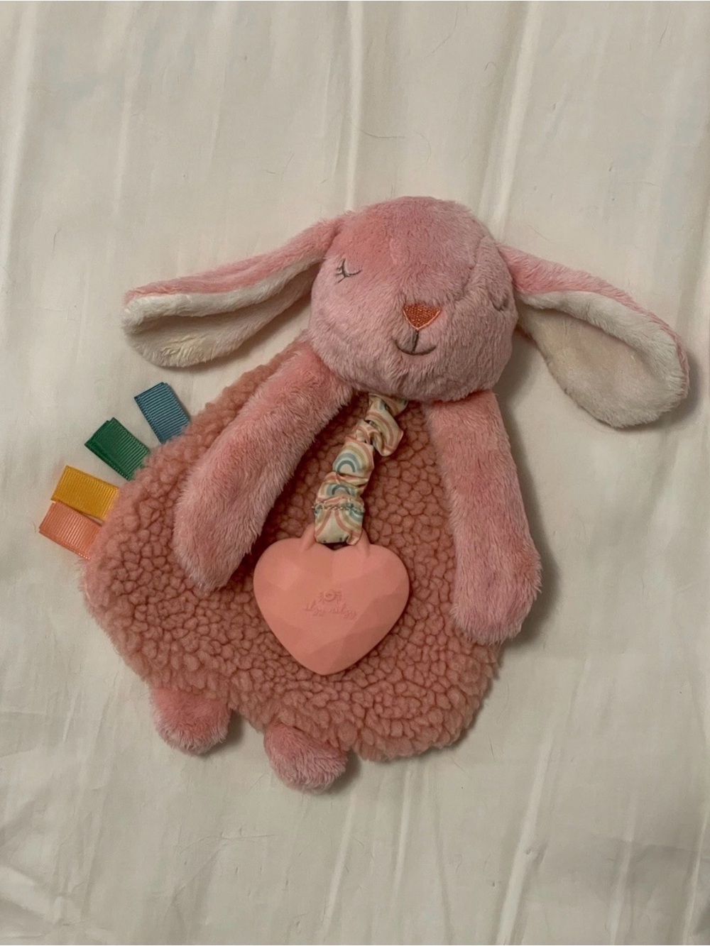 itzy ritzy lovey pink bunny teether toy pull tags crunchy sherpa sensory toy